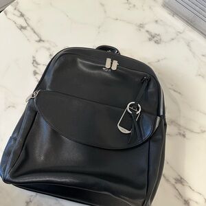Tumi Black Backpack with Silver Accents